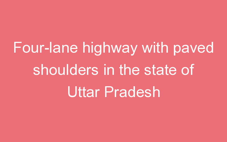 Four-lane highway with paved shoulders in the state of Uttar Pradesh